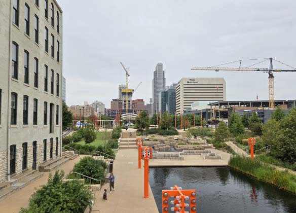 Tower cranes hover above downtown Omaha. Both of these projects are highlighted in this month's construction video
