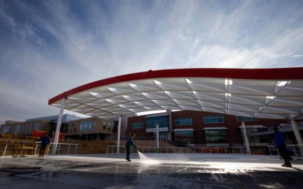 Workers prepared the ice under the new canopy recently at the UNMC Ice Rink. (Kiley Cruse/UNMC)