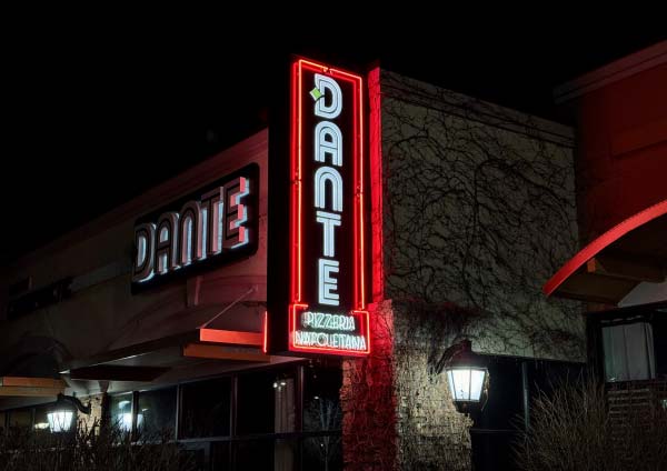Dante Omaha restaurant lit building signs at night