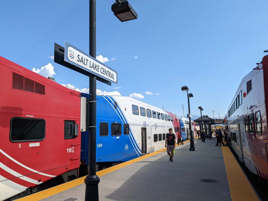 Passengers board and alight northbound and southbound commuter rail trains in Salt Lake City