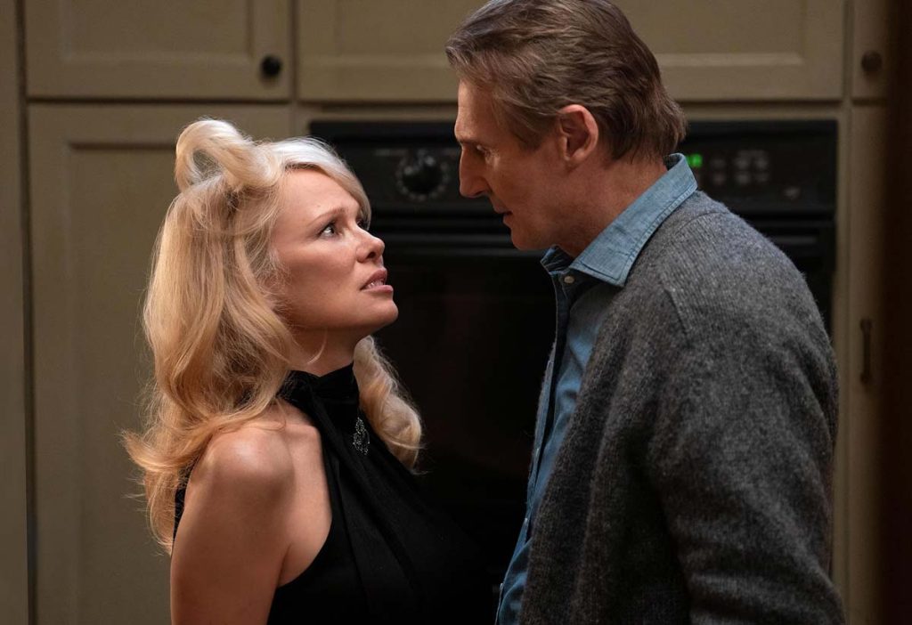 Pamela Anderson as Beth Davenport and Liam Neeson as Frank Drebin Jr